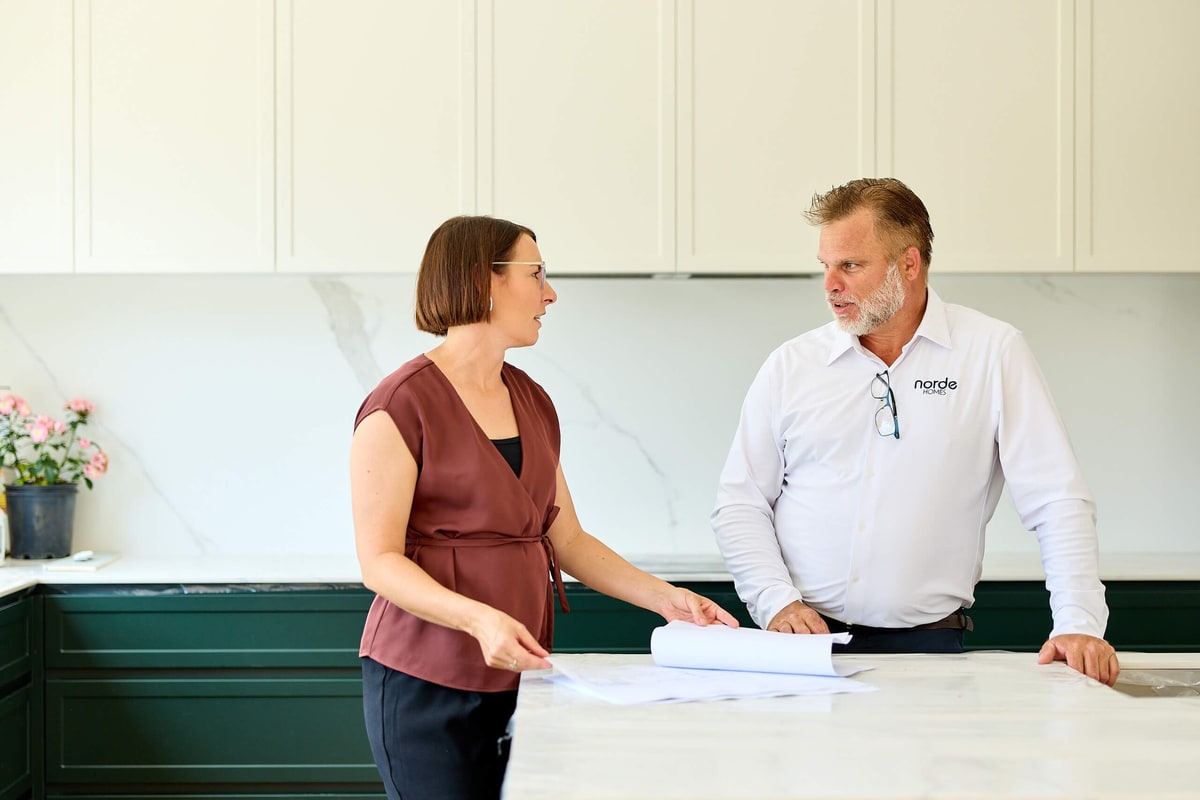 Marco and Hayley from Norde Homes talking through plans